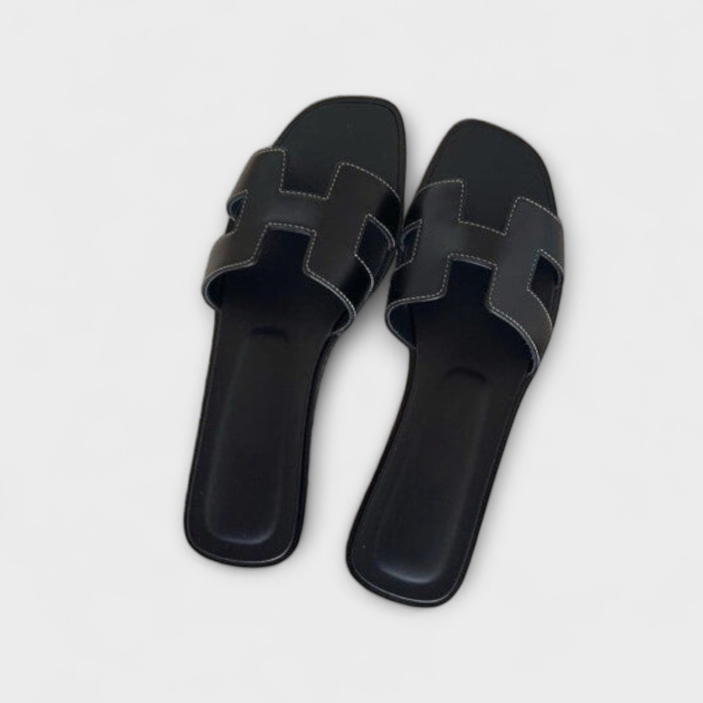 Greta – Sandalias Planas Slip-On